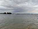 Water sport lake with dog friendly area and restaurants 10 mins walk from site.