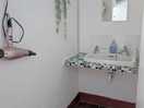 Area to use a mirror and hair dryer