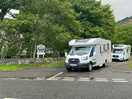 Camper vans leaving the site