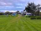 Level, grass pitches.