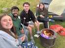 Enjoying the campfire.