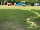 Stearman biplane behind our pitch.