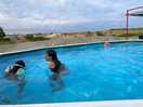 Above ground small swimming pool.
