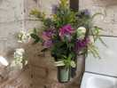 Beautiful cut flowers in the shower room