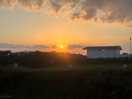 Sunsetting over the shower block of an evening