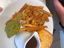 Steak and ale pie chips and mushy peas