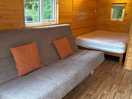 The double bed in the corner and the sofa that pulls out into a double bed.