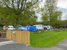 Flat, grassy pitches, close to campsite facilities.