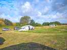 Lots of room for tents and campervans also motorhomes.