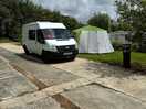 Van and tent on pitch