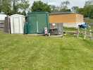 The two shower/ toilet cubicles and washing up area.