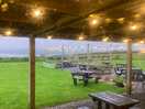 On site bar from inside on a rainy evening