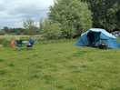 Photo of our pitch, tent and table and chairs.
