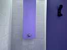 Unisex showers not that big or inviting
