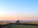View from path next to campsite towards lindisfarne