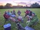 Our group eating pizza at sunset!