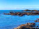 Rocky shore and clear sea