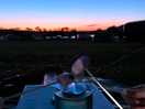 Roasting marshmallows watching the sunset