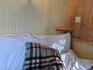 Double bed with side shelves