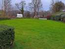 Grassed area opposite our plot