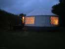 Oak yurt at night