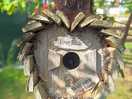 Beautiful handcrafted bird boxes on the campsite