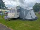 This photo of my caravan and the pitch was lovely and clean and very level