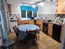 Kitchen with provided facilities.