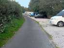 Narrow path to manoeuvre a caravan onto the pitch