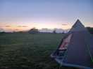 Tent pitched in field