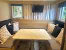 Dining area goes into a double bed