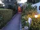 Entrance to the shower block at dusk.