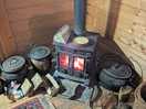 Log burner and wood in the corner
