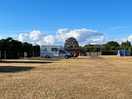 Grass pitches far enough apart with some hedges providing privacy from from access road in the site