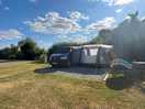 Pitch 26 - it’s large enough for a campervan & awning. has water & electric hookup