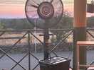 Welcome fan with mister at bar/restaurant.