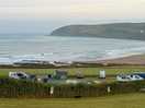 Overlooking the campsite down across the bay from the top of the field car park next door
