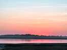 Walk a few minutes to see stunning sunsets at the estuary