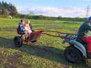 The owner let the kids have a ride around the site, this made their day