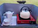 Pot of tea in the fresh morning air after a great night sleep.