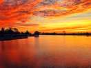 Sunrise over lake on site