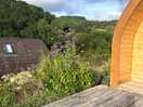 Beautiful view behind the pod in the distance.
