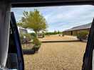View from my camper india blue, over looking neighbouring hard standing pitch & entrance.