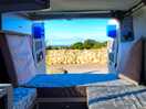 View out of our campervan, sea in the distance