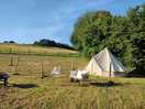 Bell tent set up on the bottom field