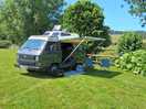 Grass pitch with electric on river side overlooking fields