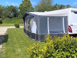 Pitch with awning and still plenty of grass area to enjoy
