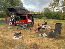 Camber van with tent box
