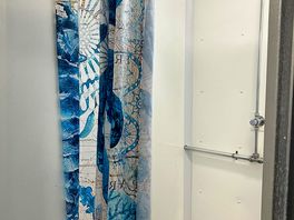 Shower with hot water and seat.