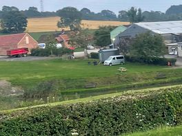 View from the main road. you can see my campervan and the two shepherd’s huts.
